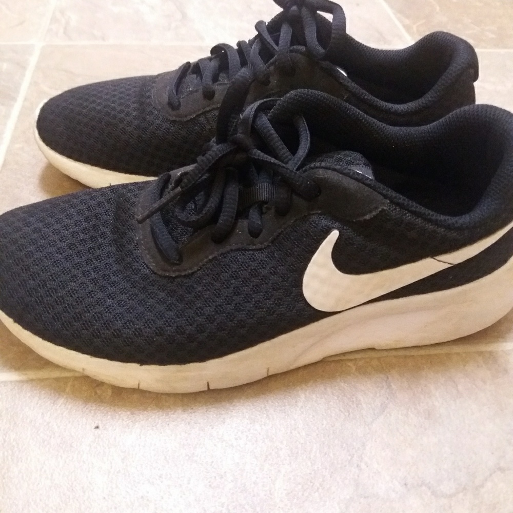 Girls black Nike sneakers size 4